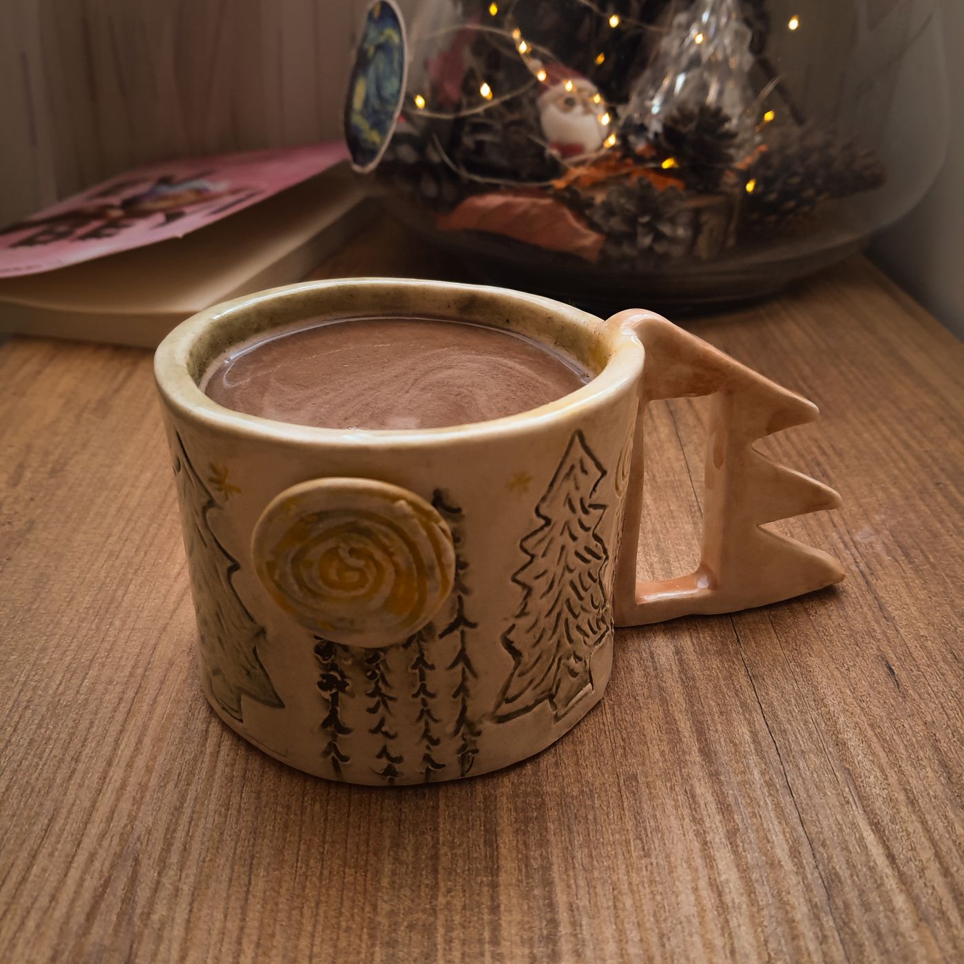 A rustic ceramic mug on a wooden table in a warm indoor setting.