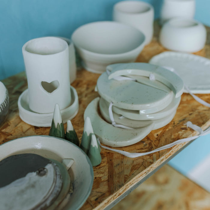 A close view of plain ceramic dishware.