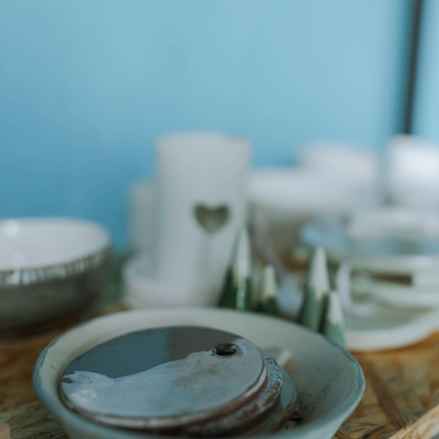 A piece of plain ceramic dishware photographed close up, with the surface filling the frame.